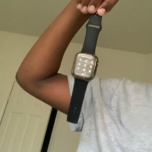 Apple Watch, 44 mm aluminum, black bands, golden watch protector